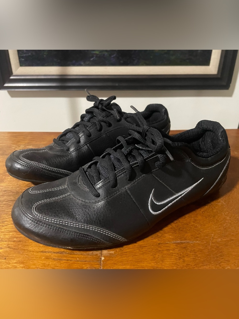 Nike Alexi Trainers Black Leather Low-Top Sneakers with Silver Swoosh